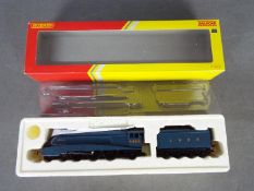 Hornby - A boxed 00 gauge DCC ready Gresley A4 loco Falcon number 4484 in blue LNER livery.