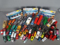 Corgi - Matchbox - Ertl - A collection of over 60 x vehicles in several scales including # K-66