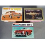 Monogram, Matchbox/AMT, MPC - Three boxed plastic 1:25 scale model car kits.