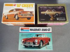 Monogram, Matchbox/AMT, MPC - Three boxed plastic 1:25 scale model car kits.