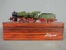 Liliput - A boxed Lilput HO gauge 4-6-0 Class P8 steam locomotive and 8 wheel bogie tender in