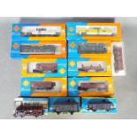 Roco, Piko, Liliput - 12 boxed items of HO gauge passenger and freight rolling stock.