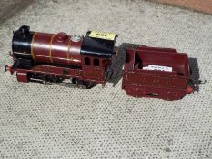 Hornby - an O gauge type 501 locomotive 0-4-0 with tender, maroon LMS op no 5600,