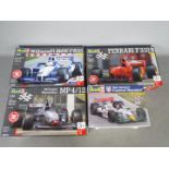 Revell - Four boxed plastic racing car model kits.