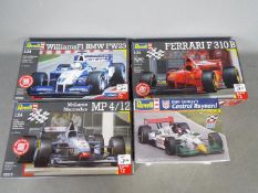 Revell - Four boxed plastic racing car model kits.