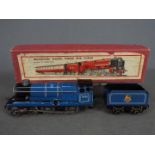 Chad Valley - an O Gauge tinplate, clockwork 4-4-0 locomotive with tender, BR blue livery,