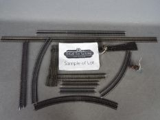 Model Railways - two boxes containing approximately 150 feet of OO gauge track to include straights,