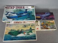Hasegawa - Four boxed 1:72 scale military aircraft plastic model kits by Hasegawa.
