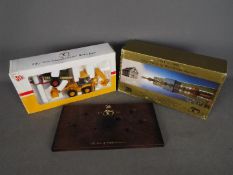 Joal - A boxed Limited Edition 'JCB 50 Years of Worldwide Service' set by Joal.