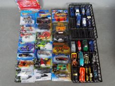 Hot Wheels - A collection of 20 carded and 19 loose Hot Wheels from various series.