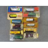 Liliput, Rivarossi, Trix - 12 boxed items of HO / OO gauge model railway freight rolling stock.