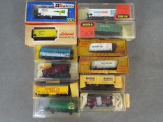 Liliput, Rivarossi, Trix - 12 boxed items of HO / OO gauge model railway freight rolling stock.