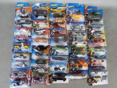 Hot Wheels - 40 carded Hot Wheels vehicles from various series on mainly short cards.