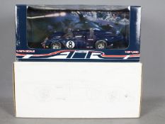 GMP - A limited edition 1:18 scale 1969 Daytona American International Racing T70 Lola Coupe number