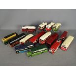 A collection of 15 built wooden model buses in 1:50 scale.