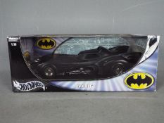 Hot Wheels - A boxed diecast 1:18 scale Batmobile by Hot Wheels.