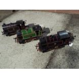 Hornby - three unboxed O gauge tank locomotives, all 0-4-0T, green LNER and two black BR,