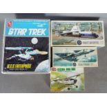 Airfix, AMT/Ertl - Four boxed plastic model kits.