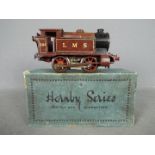 Hornby - an O gauge tank locomotive 0-4-0T, LMS maroon livery, op no 2115,