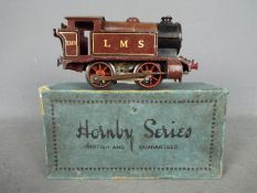 Hornby - an O gauge tank locomotive 0-4-0T, LMS maroon livery, op no 2115,