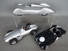 Auto Art, CSM, Revell - Three 1:18 scale diecast model cars.