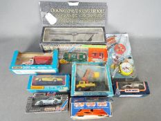 Matchbox, Tonka, Corgi - A boxed group of diecast and tinplate model vehicles.