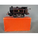 Hornby - an O gauge tank locomotive 0-4-0T, BR black livery, op no 82011,