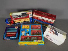 Corgi - A group of 7 x boxed models including a limited edition Mack truck produced for the 2000