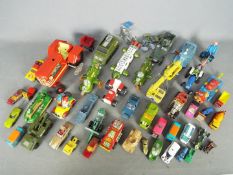 Dinky - Gama - Matchbox - A collection of over 30 x loose vehicles including a vintage Gama