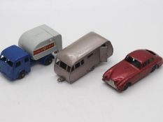 Matchbox - A group of 3 x vehicles including # 53 Aston Martin in rare red with black plastic