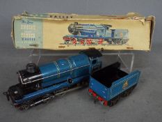 Chad Valley - an O Gauge tinplate, clockwork 4-4-0 locomotive with tender, BR blue livery,