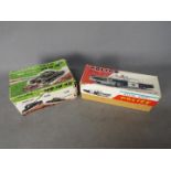 Ichiko - Tomyline - 2 x boxed vintage battery powered vehicles,