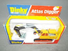 Dinky - A # 984 Atlas Digger in a window type box,