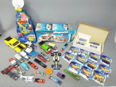 Ertl - Hot Wheels - Playmobil - A collection of boxed and loose model vehicles in various scales