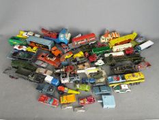 Dinky - Corgi - Matchbox - A quantity of over 50 loose diecast vehicles in various scales including