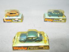 Dinky - A group of 3 x vehicles, # 129 Volkswagen Beetle 1300 Sedan, # 168 Ford Escort MkI,