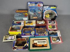 Corgi, Lledo, Others - A mixed collection of mostly boxed diecast and a handheld Pac-Man game.