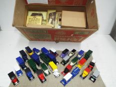 Lledo / Matchbox - a collection of approximately 30 diecast model motor vehicles,