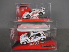 Scalextric - a Scalextric Tecnitoys GT Porsche 911 GT3 Cup #6281 and an SCX Rally Mitsubishi