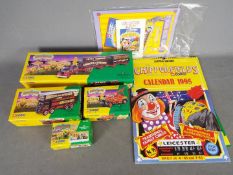 Corgi Classics - A collection of 4 x boxed Showmans Range items with associated posters.