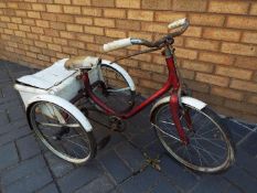 Triang - A vintage Triang Tricycle with with rear carrier / boot.