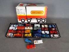 Matchbox - A carry case with 2 x trays and 27 x loose vehicles including # 55 Mercury Commuter