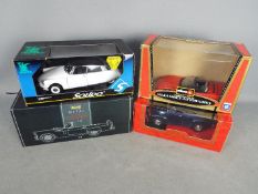 Solido, Mira, Revell, Bburago - Four boxed diecast 1:18 scale models.