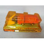 Dinky - A boxed # 439 Ford D800 Snowplough & Tipper Truck with orange cab and back.