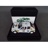 OSC Original Slot Cars - a Peugeot 205 T16 Evo1 Mouton-Harryman > Monte Carlo 1986 model slot car,