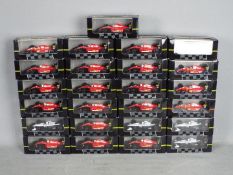 Onyx - 25 boxed diecast F1 racing cars by Onyx.