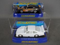Scalextric - two 1:32 scale models comprising Chevrolet Impala SS Undecorated #2957 and Lotus Exige