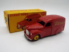 Dinky Toys - A boxed Dinky Toys #471 Austin Van 'Nestles'.