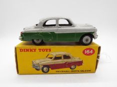 Dinky - A boxed # 164 Vauxhall Cresta in two tone green and grey in Good condition,