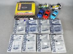 Hornby Slot Cars - a lot to include seven GB Track Accessory kits,